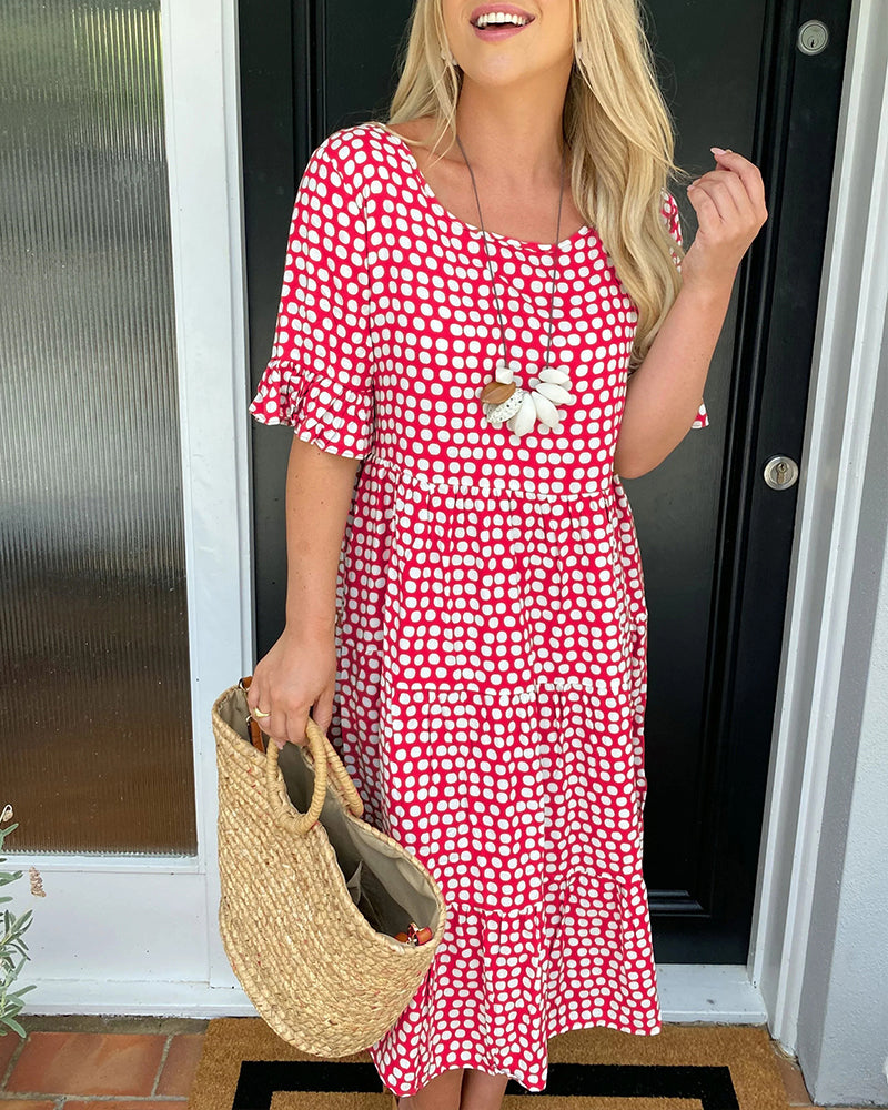 Dolly| Midi-jurk met ronde hals en stippenprint