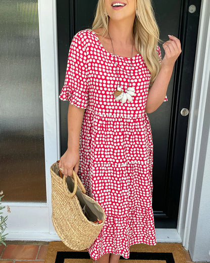 Dolly| Midi-jurk met ronde hals en stippenprint