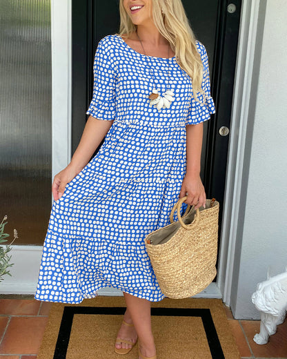 Dolly| Midi-jurk met ronde hals en stippenprint